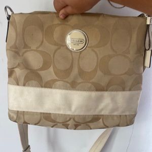 Beige Coach cross body bag 12 in. wide. Very spacious.